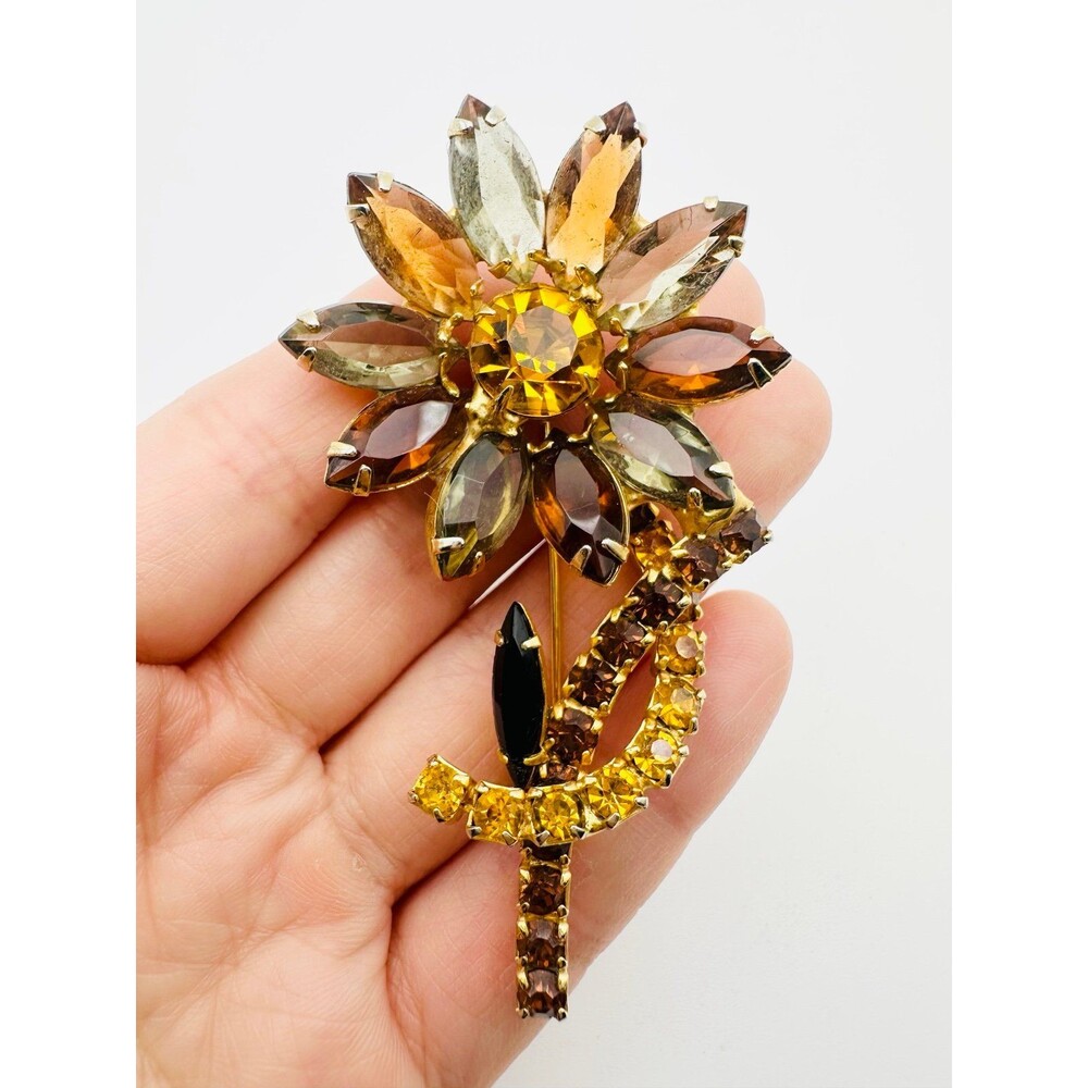 Vintage unsigned gold tone amber color rhinestone floral Brooch